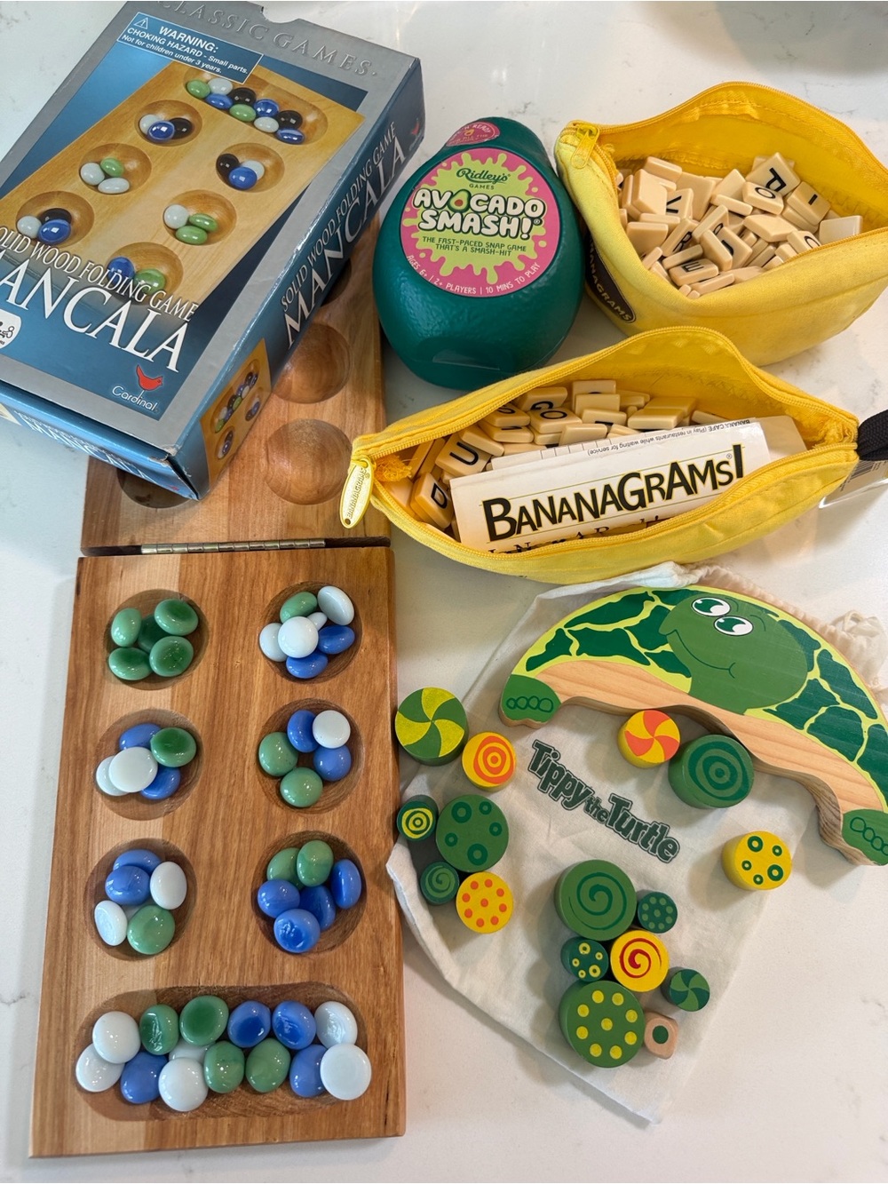 4 games: Bananagrams x 2, Mancala, Avocado Smash & Tippy the Turtle